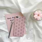 Funda para iPhone rosa con estampado de caras de melocotón